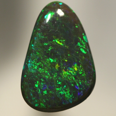 SOLID BLACK OPAL Strong golden fire, top quality.  SEE VIDEO